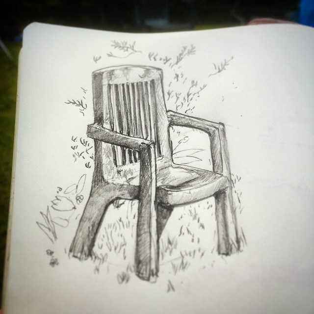 82/365 Ye olde plastic garden chair. A small window of seasonally appropriate weather hits the UK. Everyone panics. But then a cold breeze resumes so. Pencil. Notebook: Ethel. https://instagram.com/p/3B3z3_ny2r/